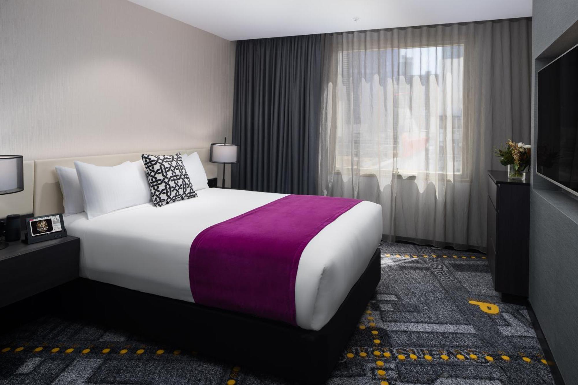 Pullman Melbourne City Centre Exteriér fotografie A bedroom at the hotel